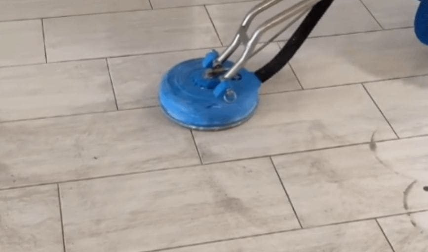 Tile floor and grout lines after cleaning
