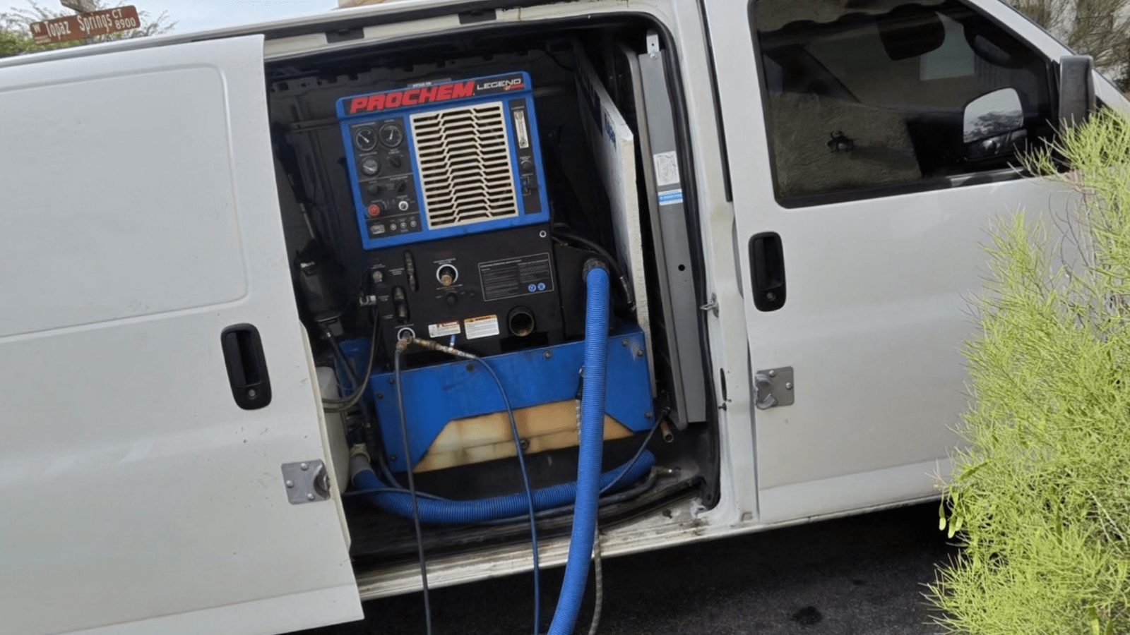 Truck-mounted hot water extraction unit inside the K&A Carpet Cleaning van
