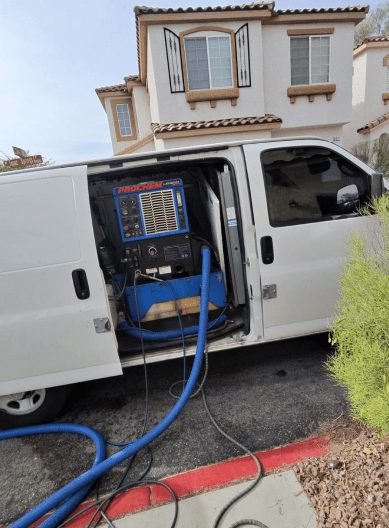 K&A Carpet Cleaning van parked outside a North Las Vegas home